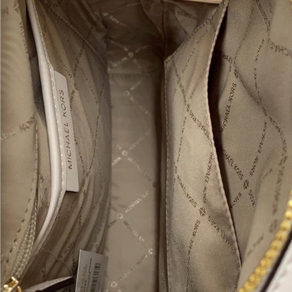 Michael Kors Jaycee Medium
Pebbled Leather Backpack Light - Picture 10 of 12